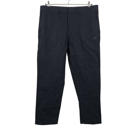Unisex Nike - Mittevenivad püksid, suurus W38 - Must ()