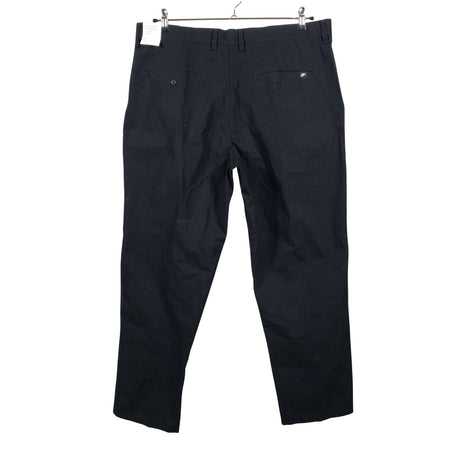 Unisex Nike - Mittevenivad püksid, suurus W38 - Must (2)