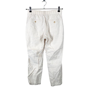 Unisex Uniqlo - Mittevenivad püksid, suurus XS - Beige (2)