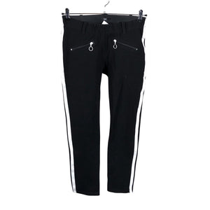 Unisex NP Collection - Mittevenivad püksid, suurus 36 - Must (1)