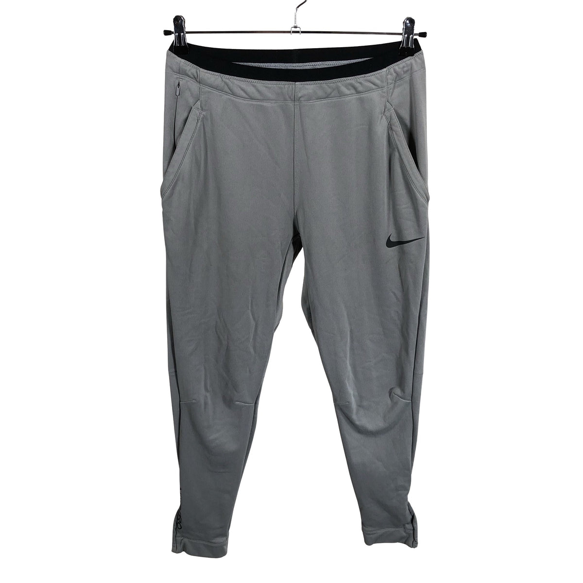 Unisex Nike - Soojenduspüksid, suurus 38 - Hall (1)