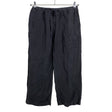 Unisex Lindex - Mittevenivad püksid, suurus 36 - Must ()