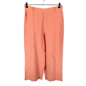 Unisex Nanso - Mittevenivad püksid, suurus 42 - Oranž (1)