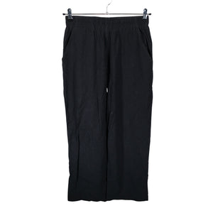 Unisex R-collection - Mittevenivad püksid, suurus 40 - Must (1)
